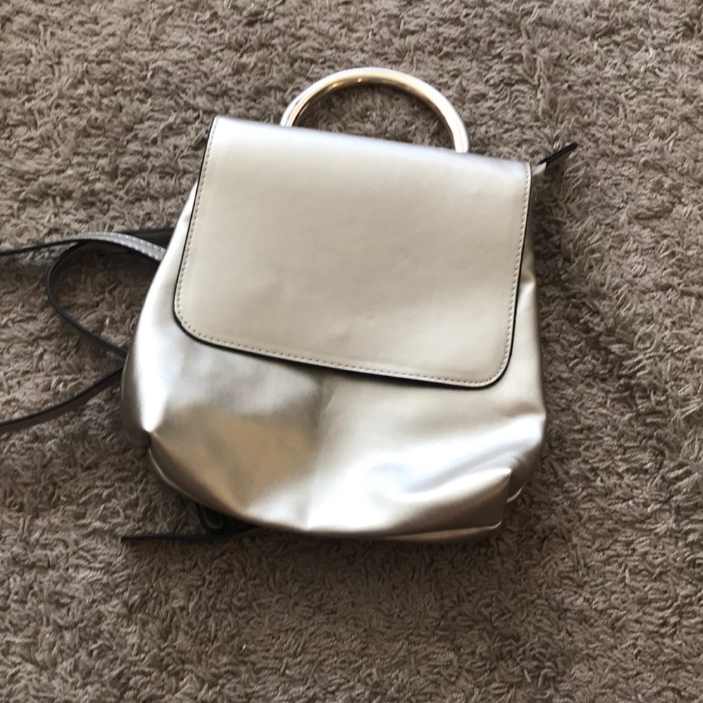 Goldish tone backpack